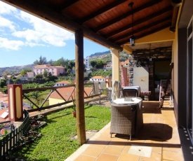 House with one bedroom in Ponta do Sol with wonderful sea view enclosed garden and WiFi 2 km from the beach